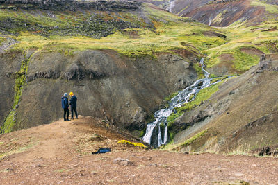 People walking in tunnel