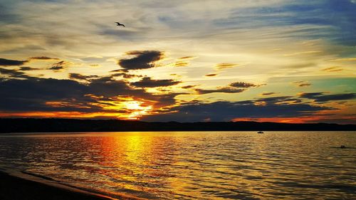 Scenic view of sunset over river