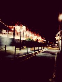 Illuminated street light at night