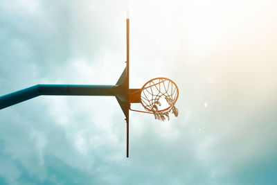 Low angle view of windmill against sky