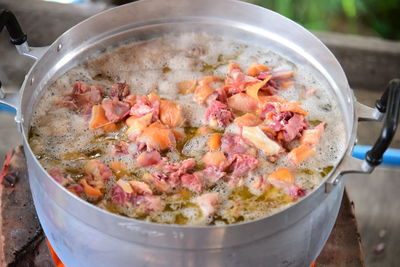 High angle view of meat in cooking pan