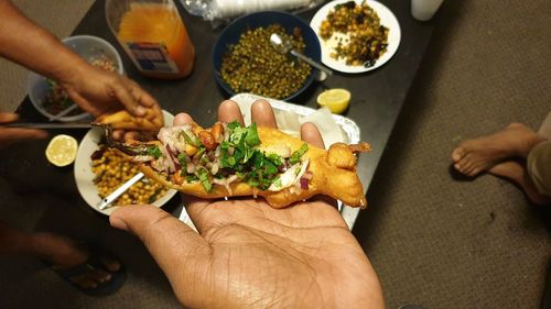 High angle view of people preparing food