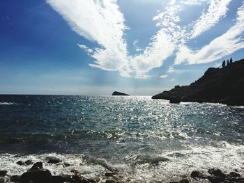 View of calm sea against blue sky