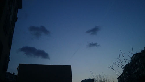 Low angle view of built structure against blue sky