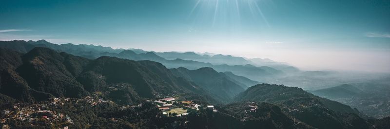 Scenic view of mountains against sky during sunset