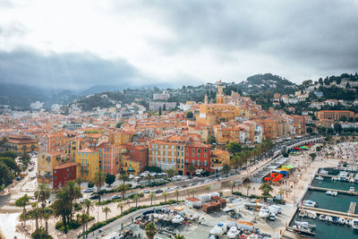 Aerial view of townscape against sky