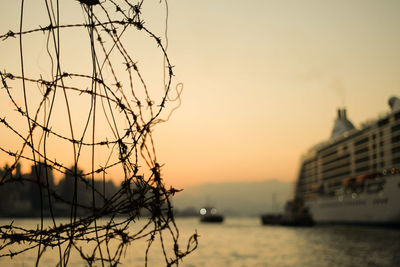 Close-up of sea against sky during sunset