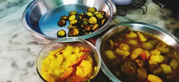 High angle view of chopped vegetables in bowl on table