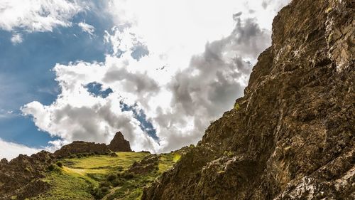 Low angle view of mountains against sky