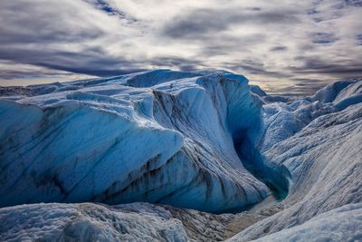 Scenic view of snowcapped mountain against sky