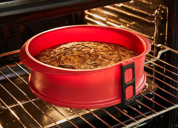 High angle view of red soup in bowl on table