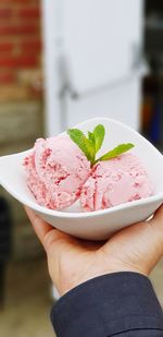 Midsection of person holding ice cream cone