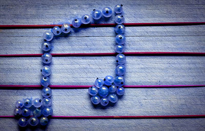 High angle view of purple and blue objects on table