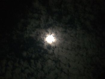 Low angle view of moon in sky at night