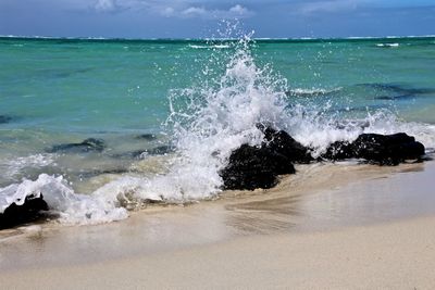 Waves breaking on beach