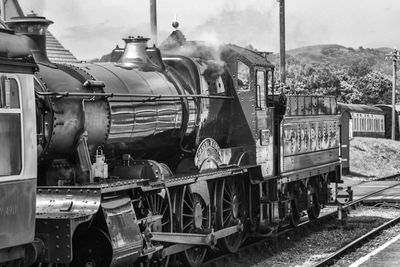 Train on railroad track against sky