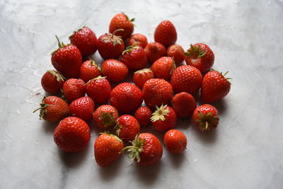 High angle view of strawberries on table
