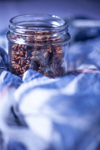 Close-up of glass of jar on table