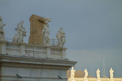 Low angle view of statue against sky