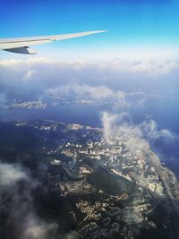 Aerial view of cityscape against sky