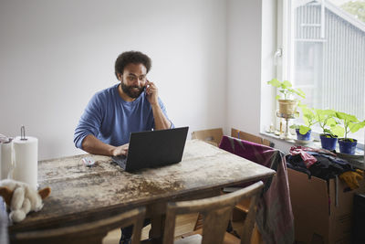 Man working on laptop from home