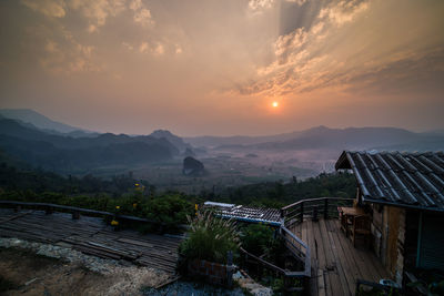 Scenic view of mountains against sky during sunset