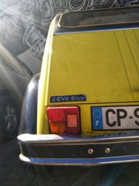 High angle view of yellow car on street