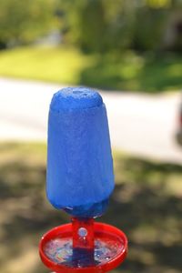 Close-up of blue drinking water