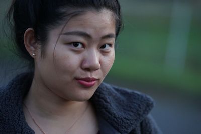 Close-up portrait of young woman