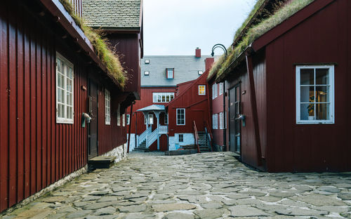 Alley amidst buildings in city