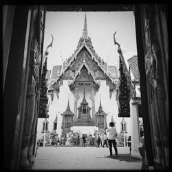 Tourists in front of building