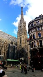 Low angle view of cathedral against cloudy sky