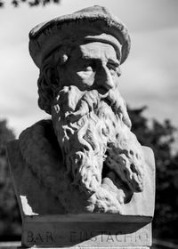 Low angle view of statue against sky