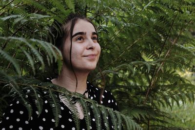 Portrait of young woman in the forest