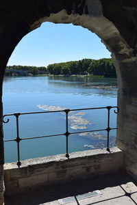 Scenic view of lake against blue sky