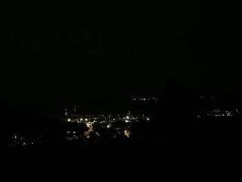 Illuminated cityscape at night