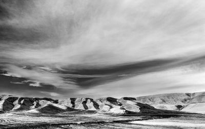 Scenic view of land against sky during winter