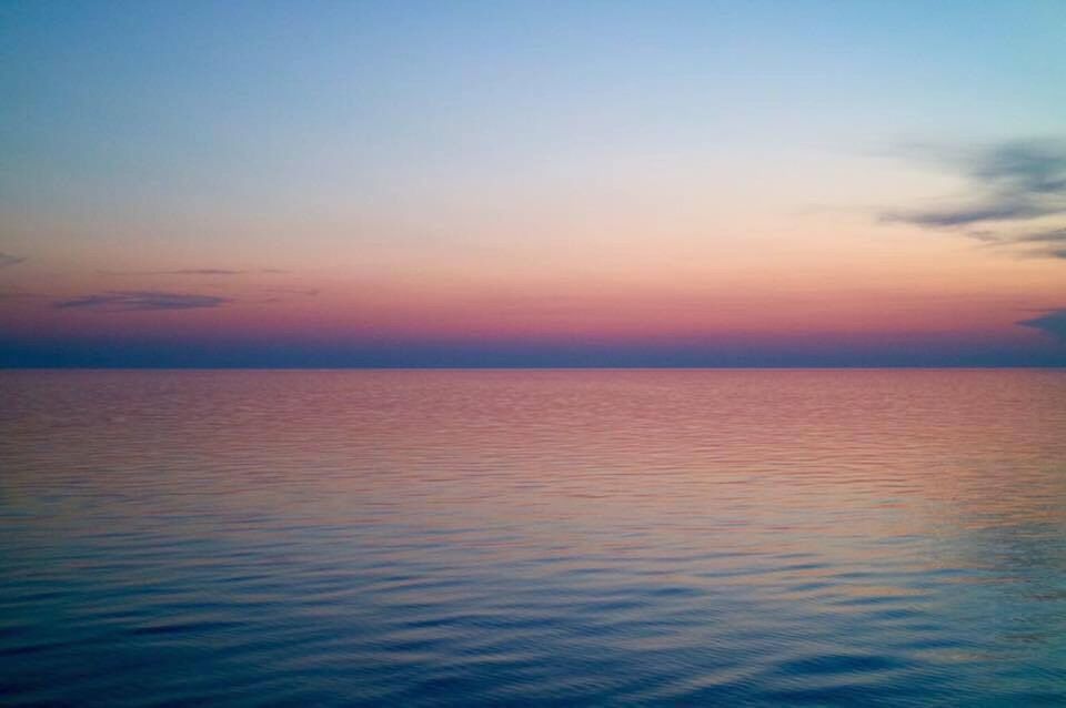 sunset, sea, sky, beauty in nature, tranquil scene, blue, nature, tranquility, water, horizon over water, scenics, outdoors, no people, dramatic sky, landscape, sun, beach, day