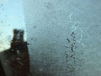 Close-up of water drops on glass