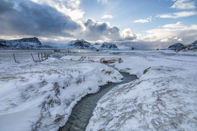 Scenic view of sea against sky during winter