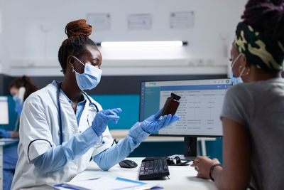 Doctor examining patient