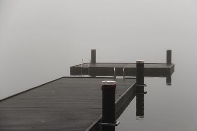Lifeguard hut on beach against sky