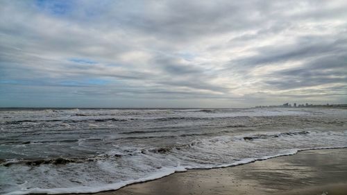 Scenic view of beach against sky