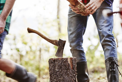 Men chopping wood