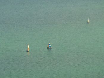 High angle view of people sailing on sea