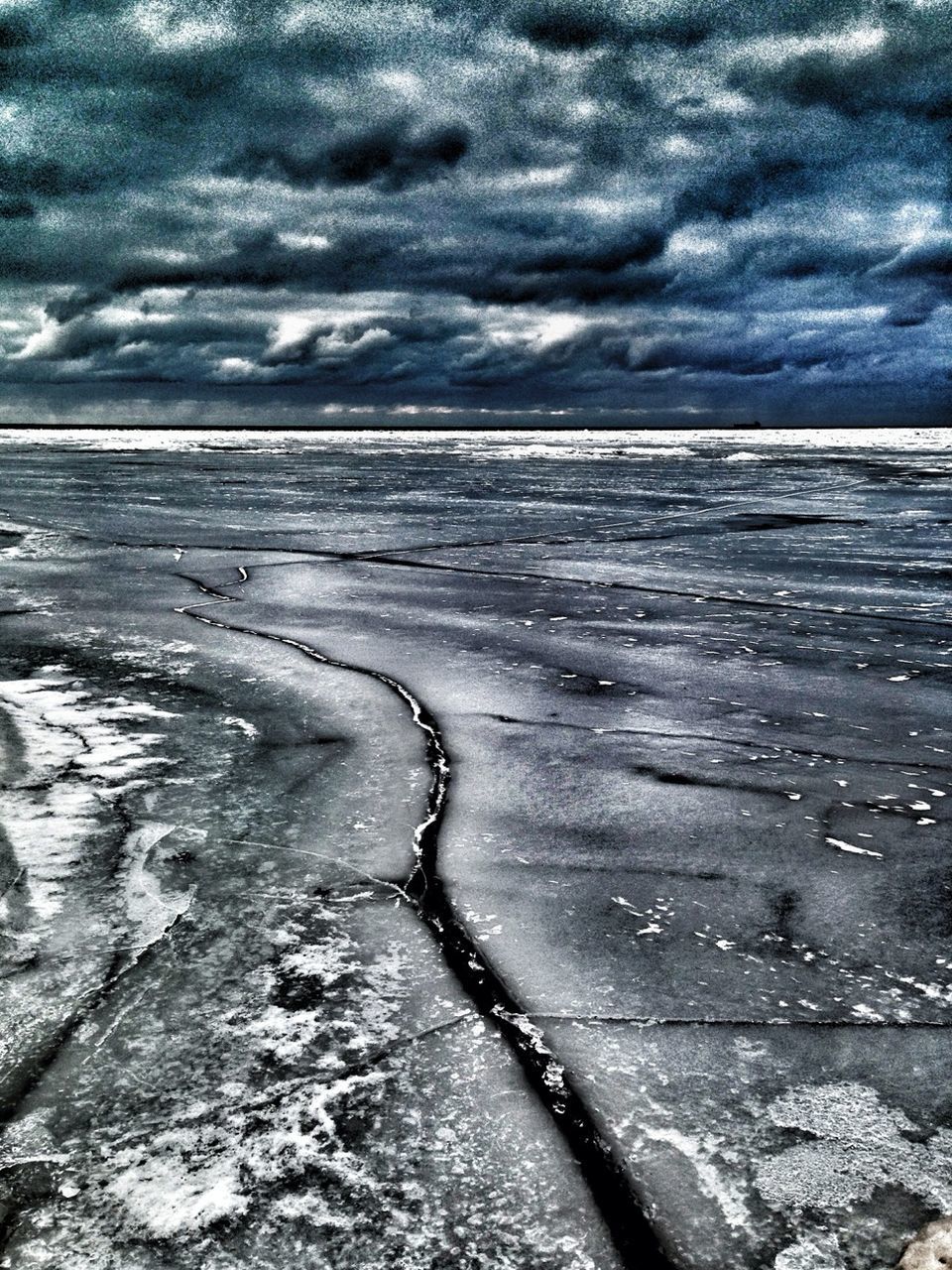 sky, cloud - sky, cloudy, water, sea, beach, tranquil scene, tranquility, weather, scenics, beauty in nature, nature, horizon over water, shore, overcast, cloud, sand, idyllic, storm cloud, outdoors