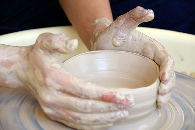 Midsection of person preparing food