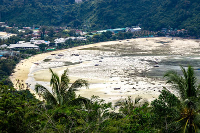 High angle view of beach against mountains