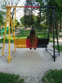 Swing sitting on bench in park