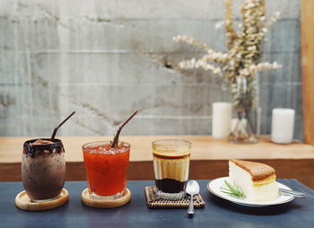 High angle view of coffee and drink on table